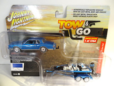 Johnny Lightning - Blue Poly - 1980 Chevy Monte Carlo With Bass Boat Trailer